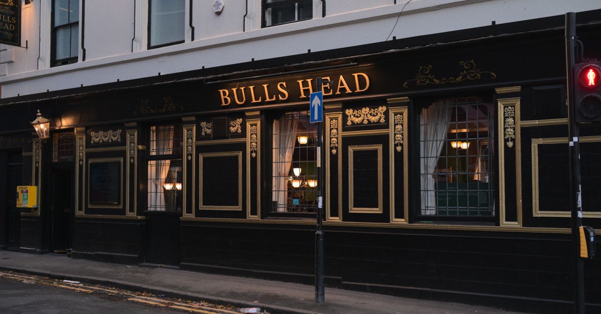 Exterior of the Bulls Head pub on Granby Row, showcasing classic architecture and evening lights.